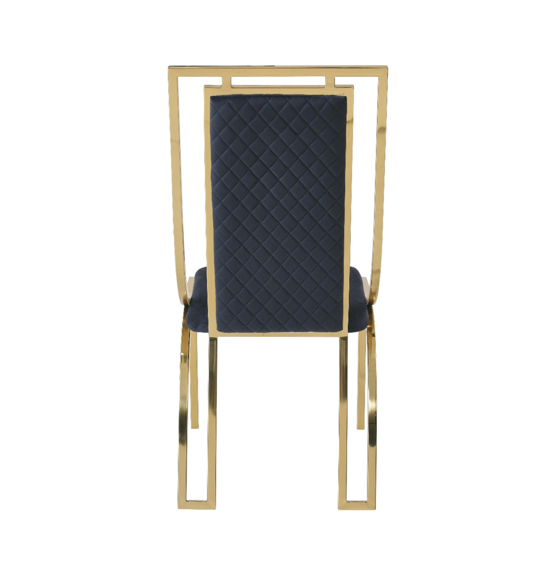 single  modern high back dining chairs with quilted cream upholstery and gold stainless steel frame, shown on light wood flooring against textured wallpaper