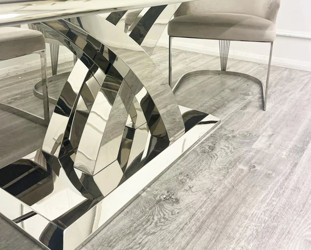 close view of a chrome color dining table leg