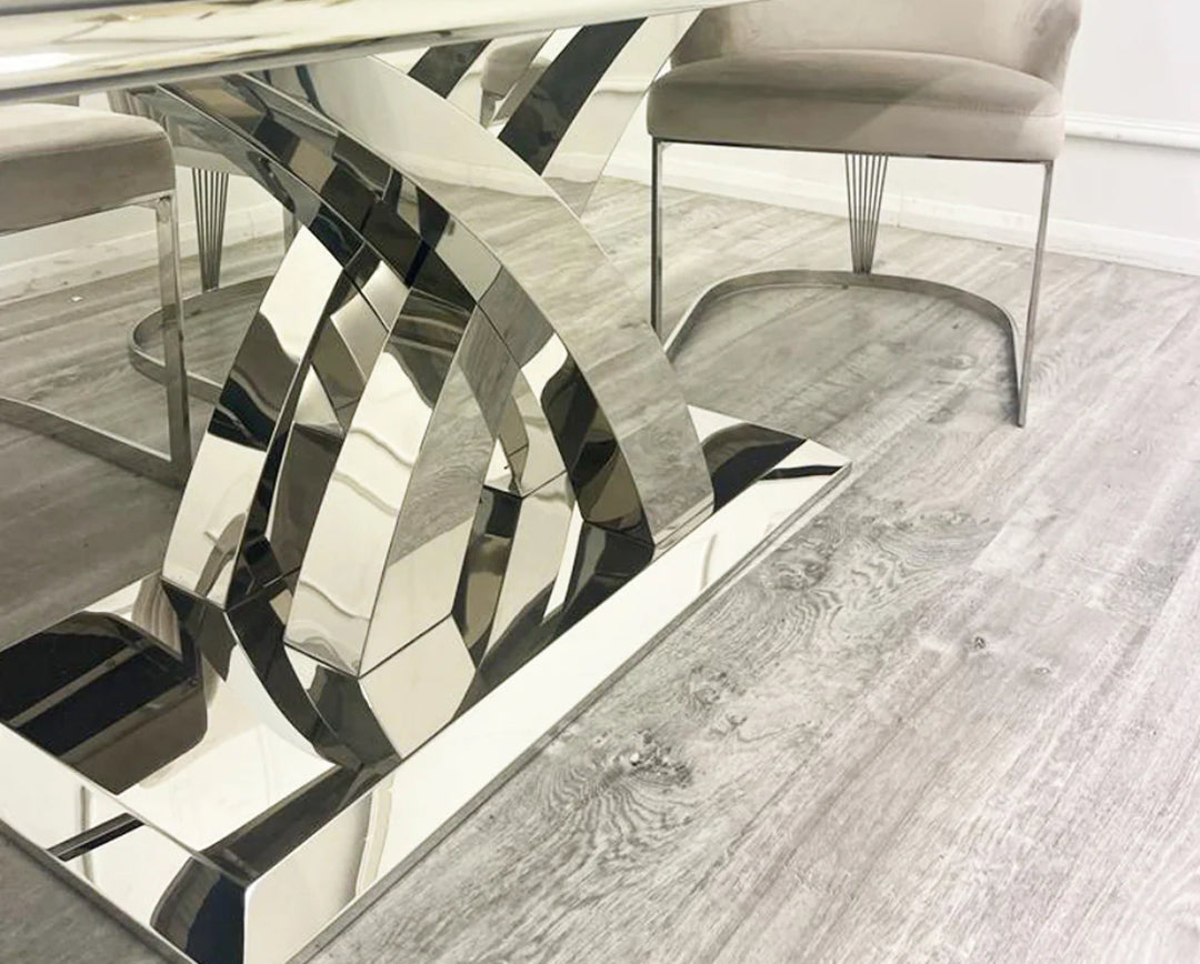 close view of a chrome color dining table leg