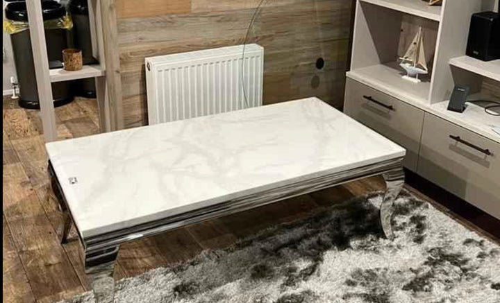 white marble table with chrome dining leg