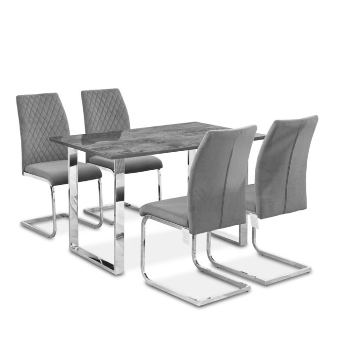 A grey dining set consisting of a rectangular table with a stone effect glass top and four matching chairs with a fabric seat and chrome frame.