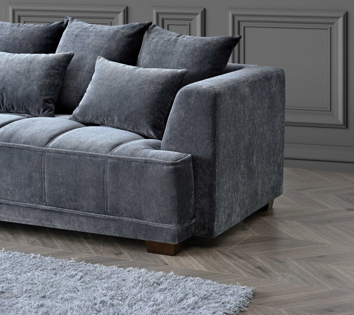 close view of grey color corner sofa with 3 sitar and 2 siter in a nice living room