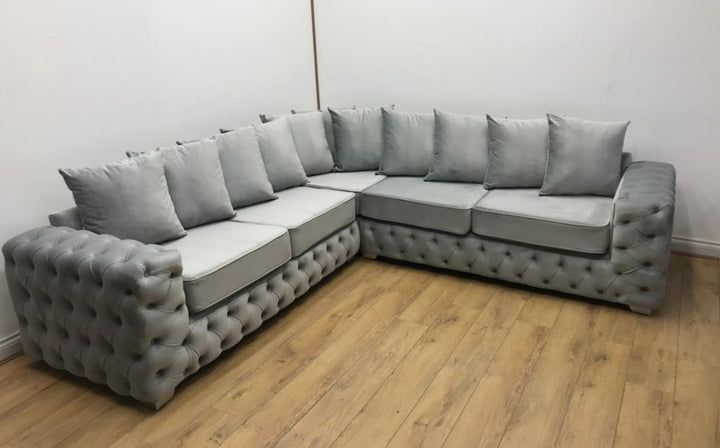 4 seater grey color sofa with sofa cushion
