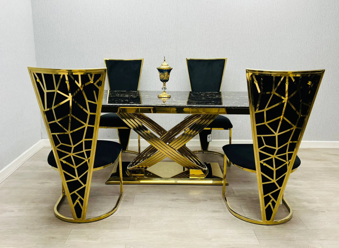 A set of black and gold dining chairs around a gold marble dining table, with intricate geometric designs on the chairs' backrests.