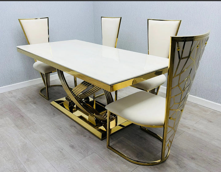 A Vienna cream and gold dining table and chair with a upholstered seat and a geometric patterned backrest in gold tone.