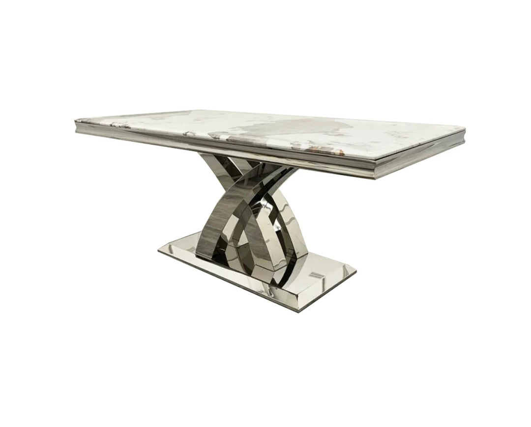 a white marble coffee table with chrome leg