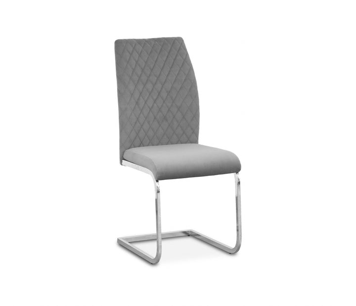 a gray dining chair with chrome chair leg