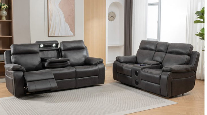 A gray TECHNO RECLINER SOFA set which includes a 3-seater and a 2-seater sofa, featuring recliner chairs, cup holders, and USB charging ports.