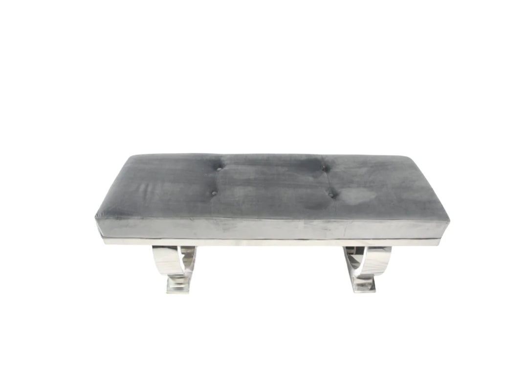Modern grey velvet bench with tufted seat and polished chrome curved legs, perfect for bedroom or hallway seating