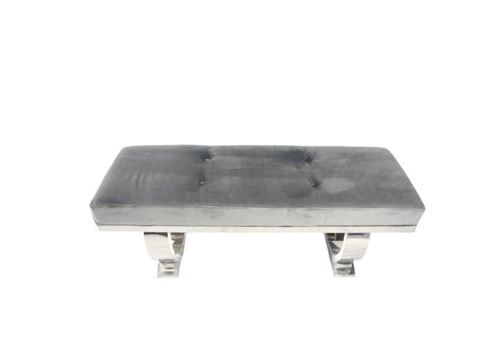 Modern grey velvet bench with tufted seat and polished chrome curved legs, perfect for bedroom or hallway seating