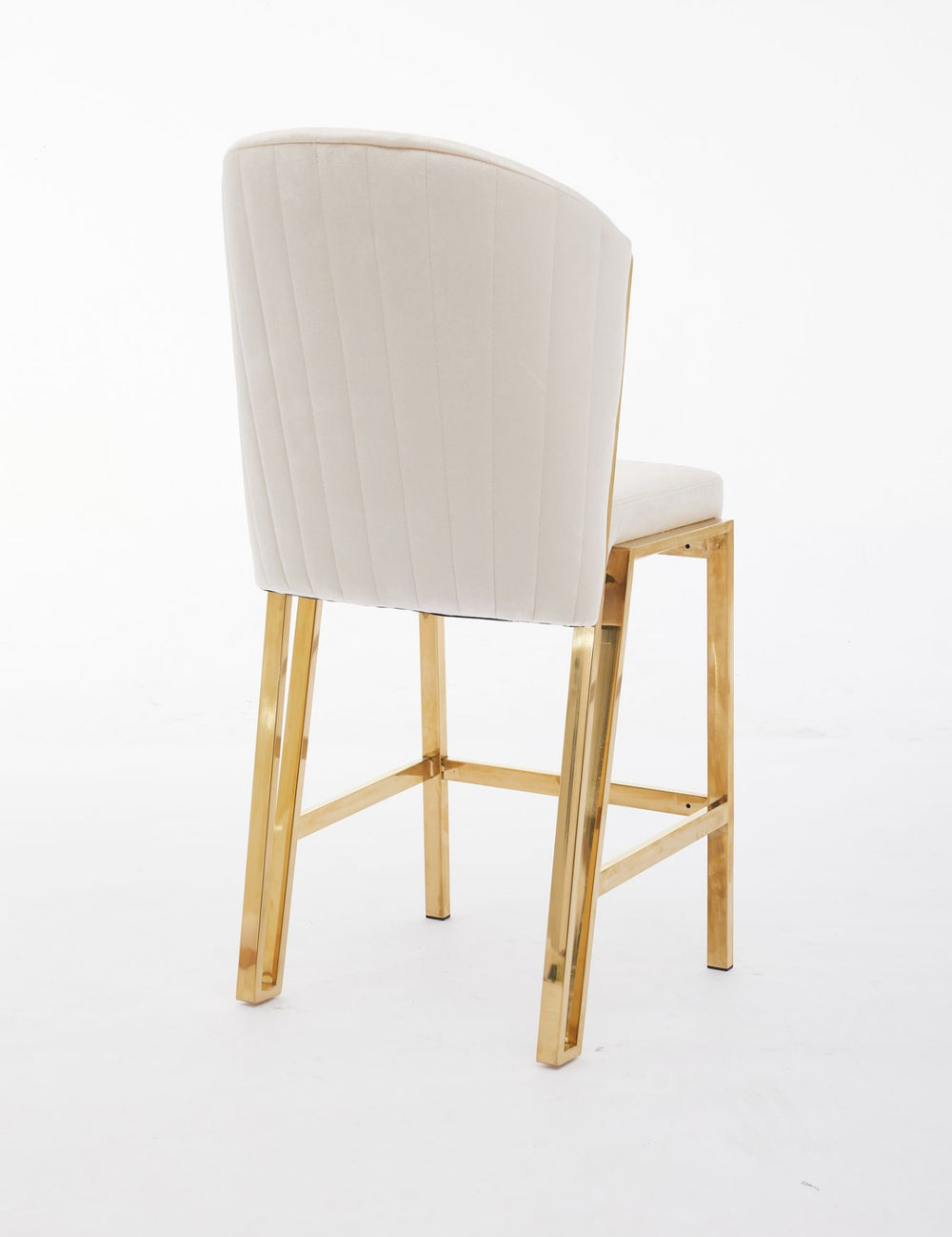 A cream upholstered bar stool with a gold metallic frame and a full backrest.