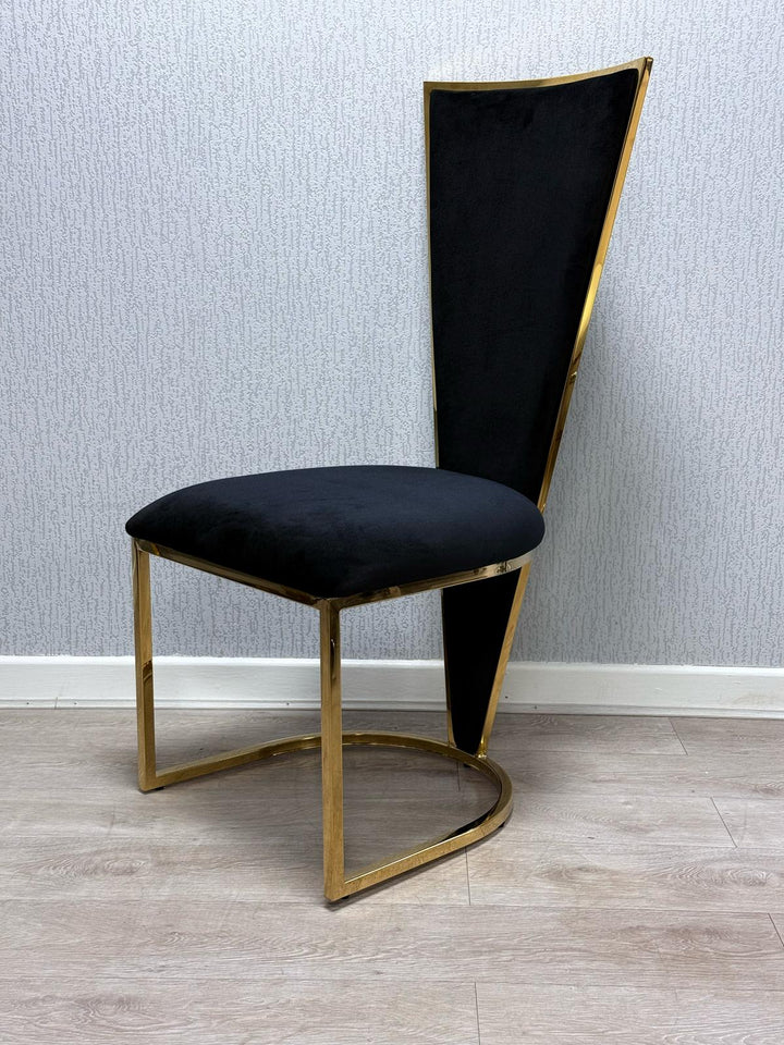 balck color chair with gold color leg and frame