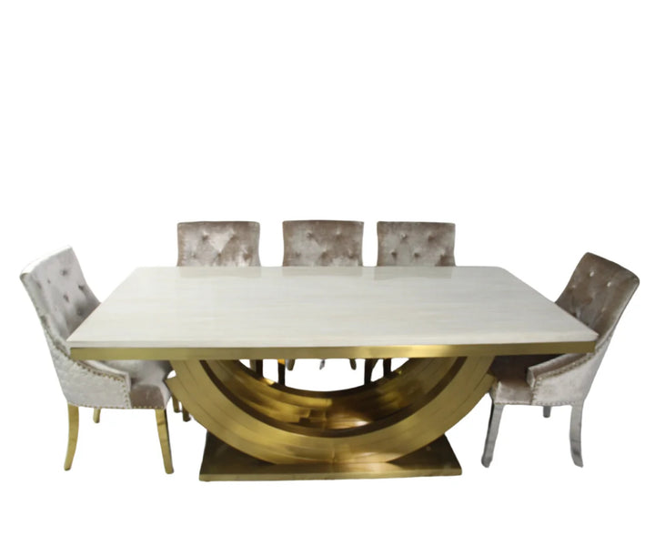 cream color dining table and chair with gold color leg