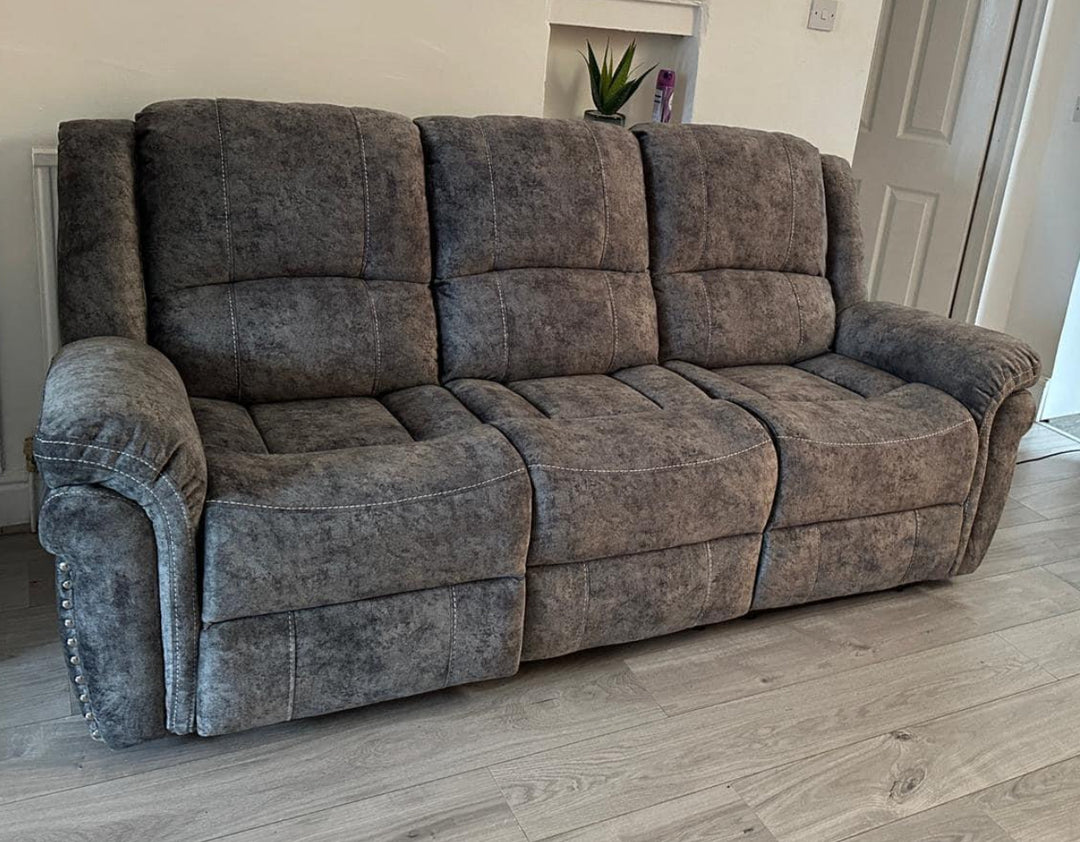 3 seater grey sofa on the leaving room