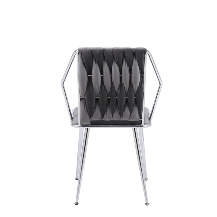 A grey fabric dining chair with a metal frame and armrests.