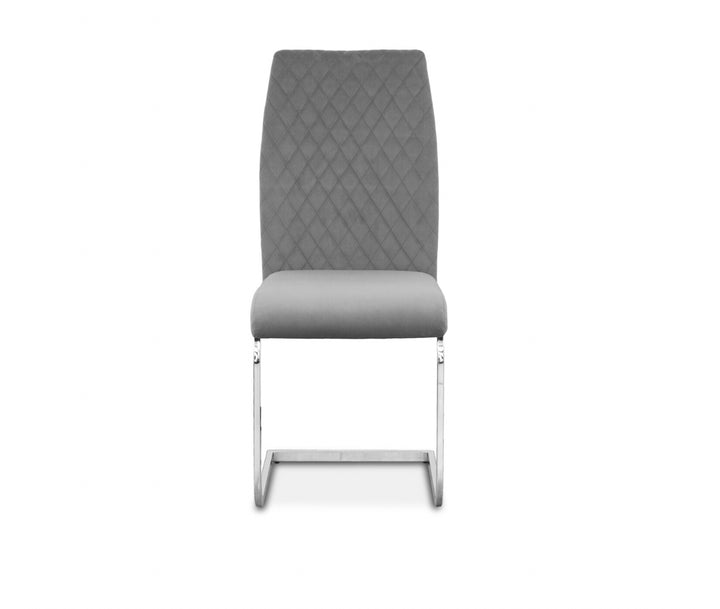 a gray dining chair with chrome chair leg