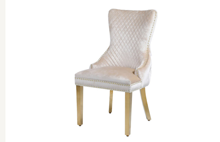 pink color dining chair with gold color leg