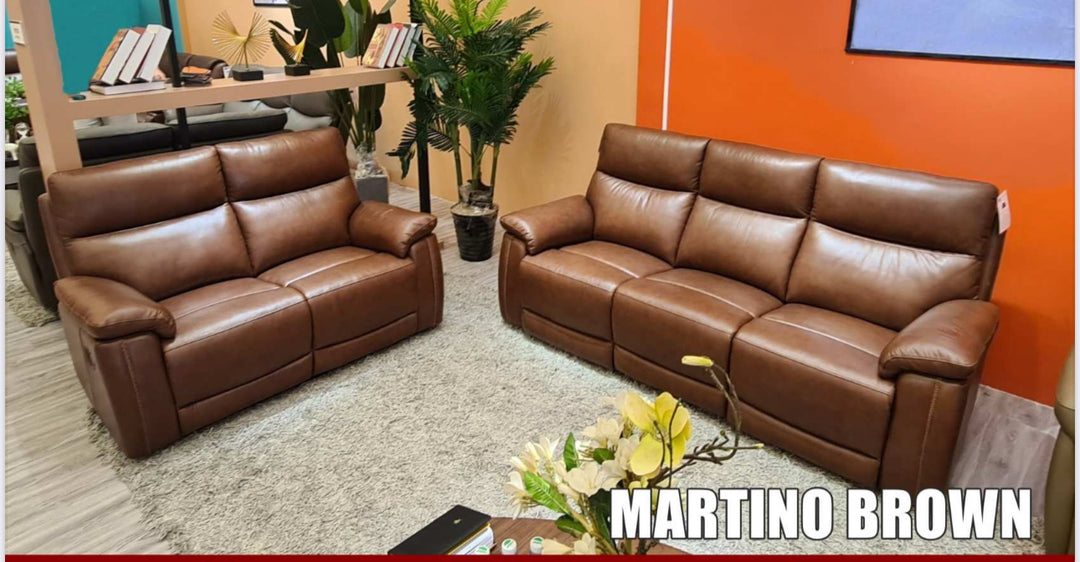 Two brown leather sofas, a two-seater on the left and a three-seater on the right, labeled 'MARTINO BROWN'.