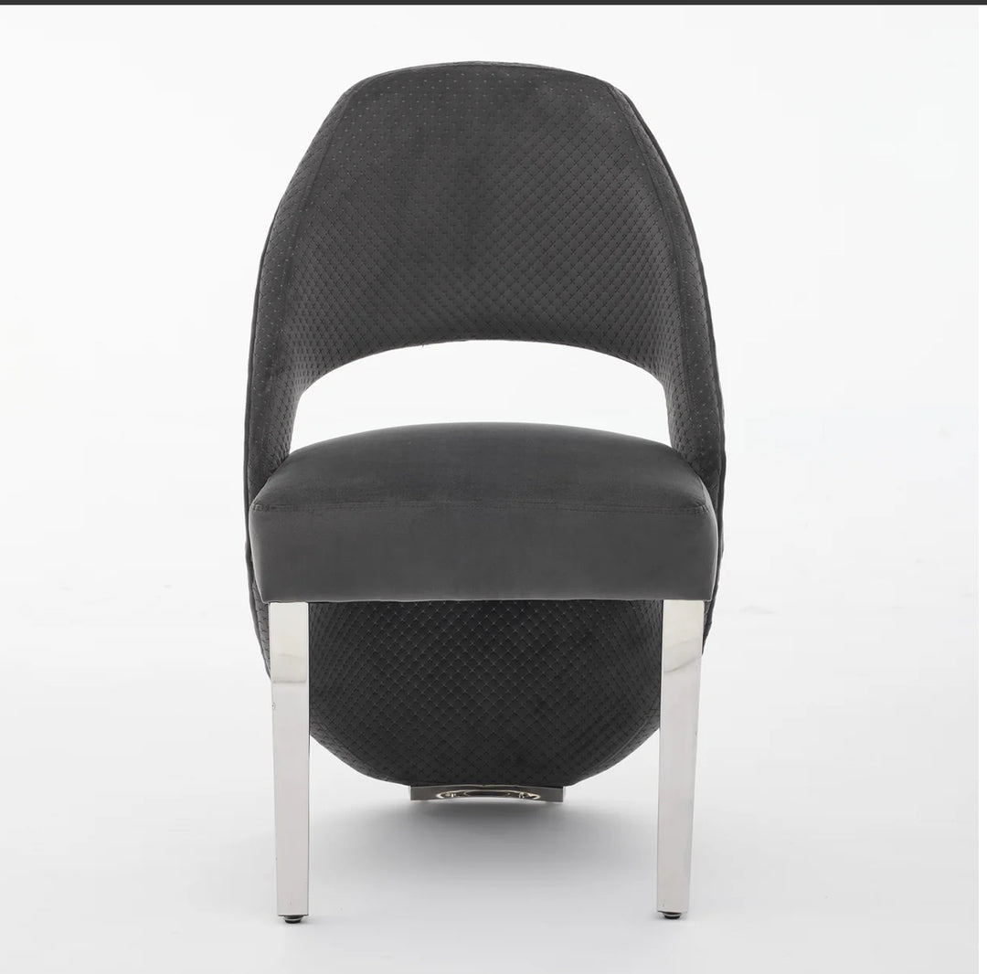 a luxury black  dining chair with silver leg font design