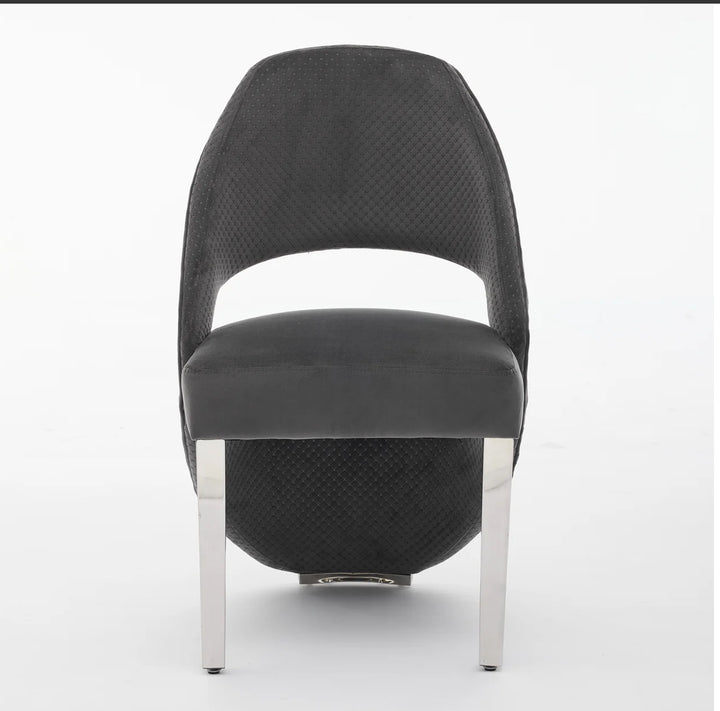 a luxury black  dining chair with silver leg font design