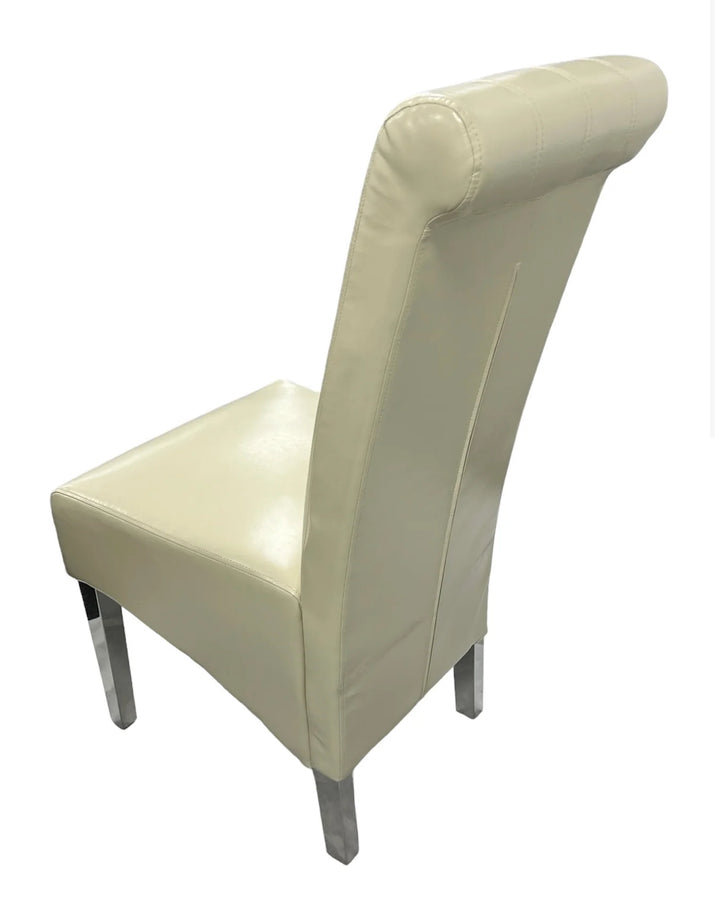 a cream color long chair with a silver color leg there back supporting is long