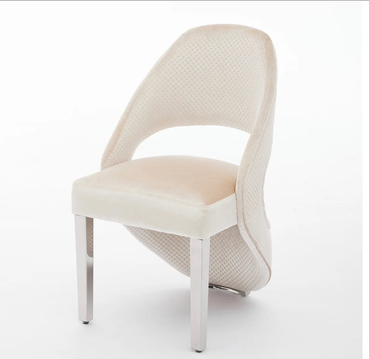 a luxury cream dining chair with silver leg left font design