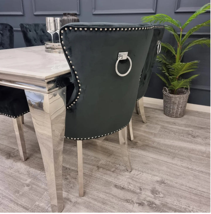 a luxury dining table with a luxury chair in a dining room