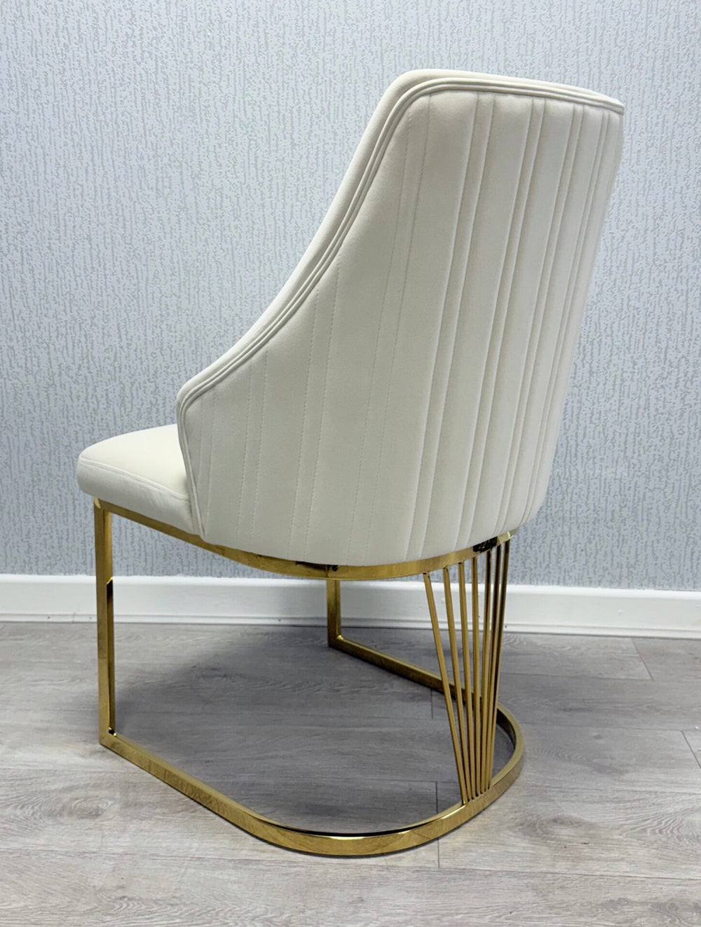 Cream chair with gold metal frame