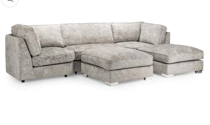 A gray u-shaped corner sofa with truffle-colored upholstery, featuring a solid wooden frame and moveable footstools.