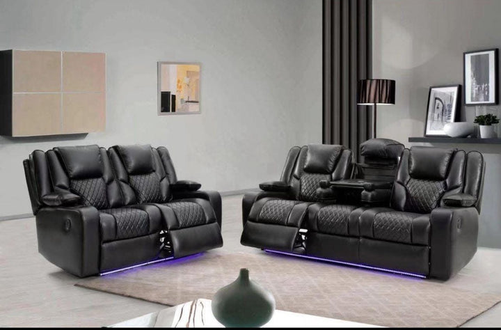 Black recliner sofa set in a modern living room with LED lighting.