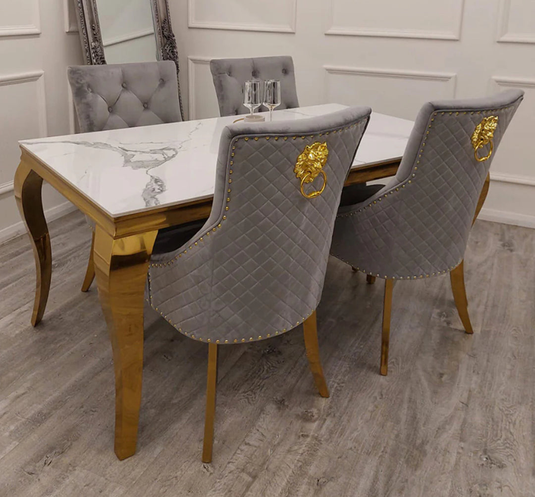 Louis Gold Dining Table + Beige Lion knocker Gold Dining Chairs