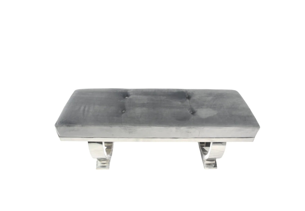 Modern grey velvet bench with tufted seat and polished chrome curved legs, perfect for bedroom or hallway seating
