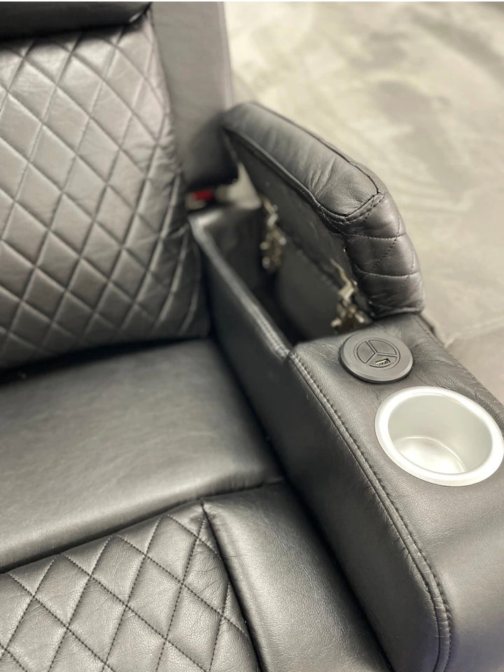 Gray quilted car seat with cup holder and armrest