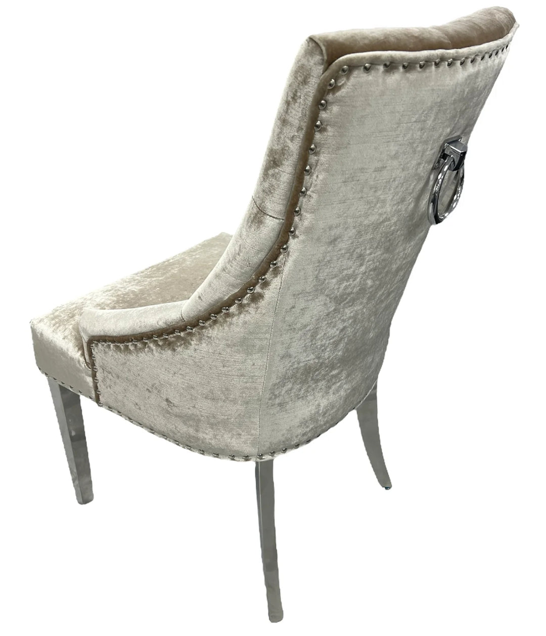 Decorative chair with patterned fabric and nailhead trim on a white background