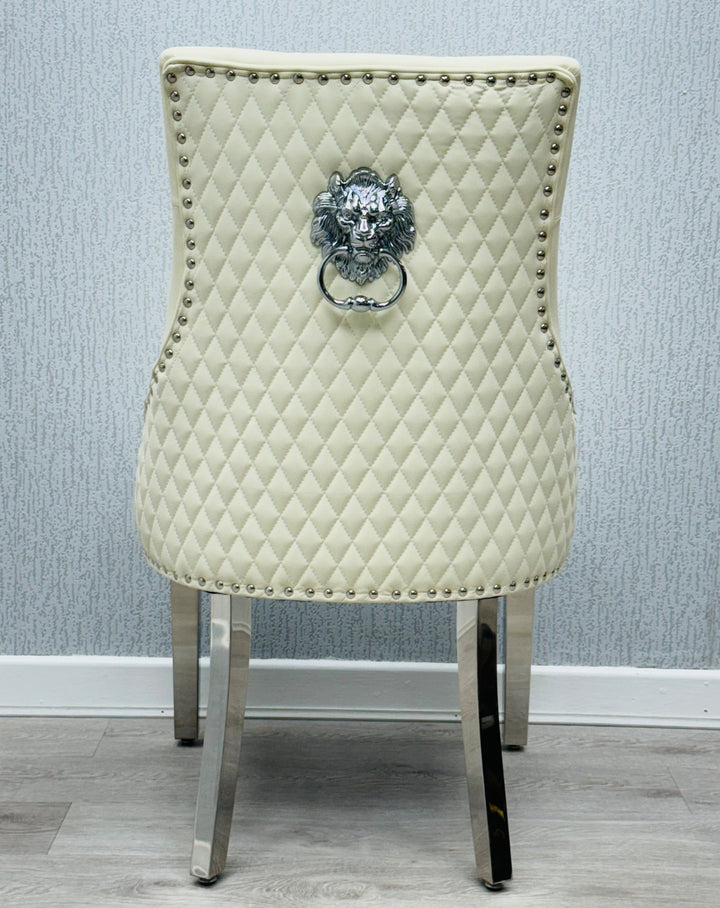  a cream color lion konker chair with chrome colour leg