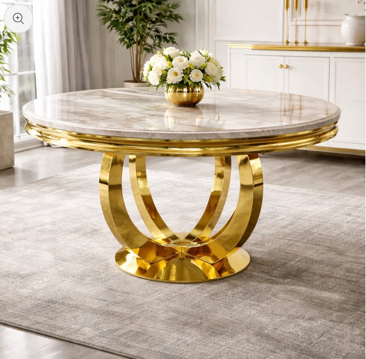 A round marble-top dining table with a polished gold metallic base, styled in a bright, modern dining room 
Cream marble top 
White marble top 
White and gold marble top 
Beige Marble atop 