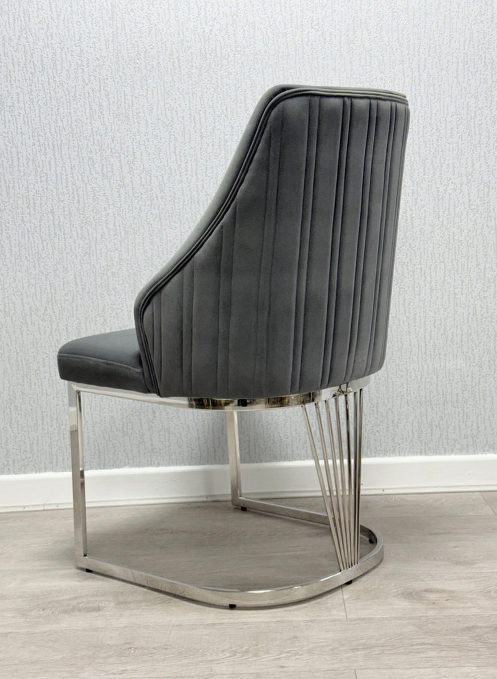 Gray upholstered chair with metal legs 