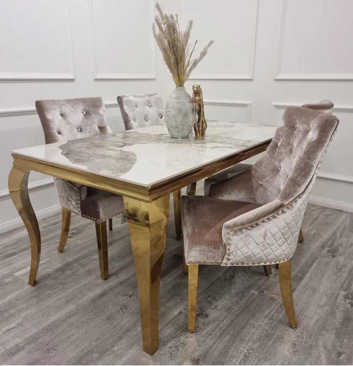 Louis Gold Dining Table + Beige Lion knocker Gold Dining Chairs