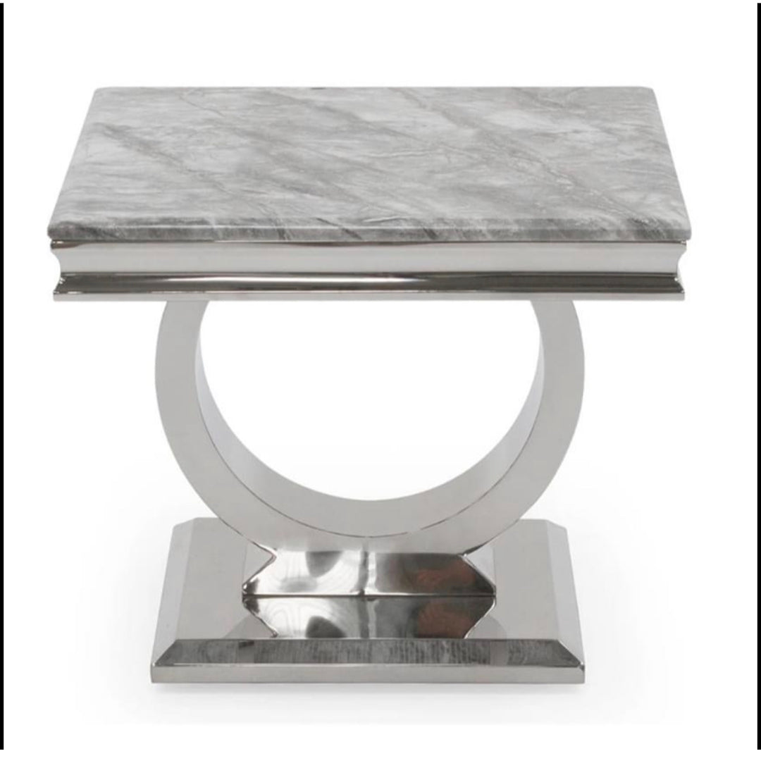 A rectangular Arianna marble lamp table with a silver stainless steel 
Side table 